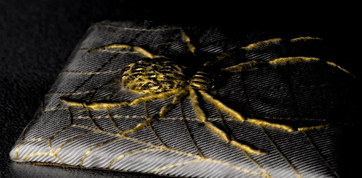 Brooch in gold and golden spider silk